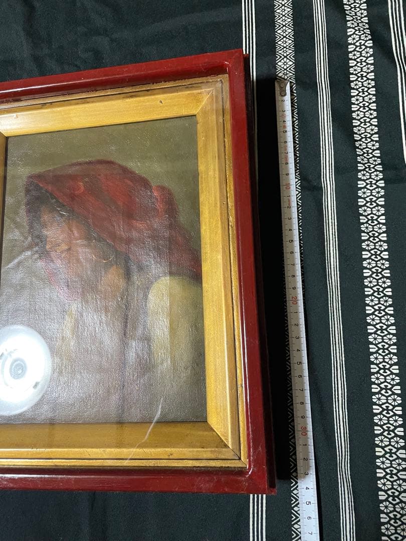 赤いフレームの人物画 FANGU