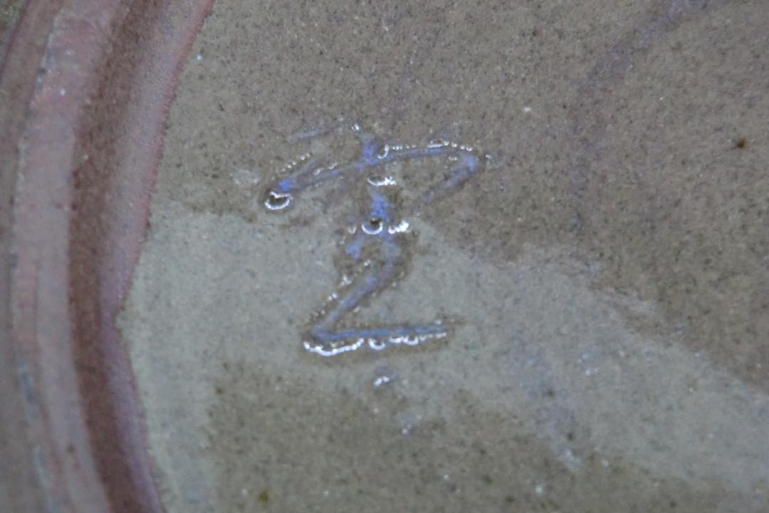 魔訶不思議なセンスの自転車の絵が描かれた陶器飾り皿 作者不詳 D10816