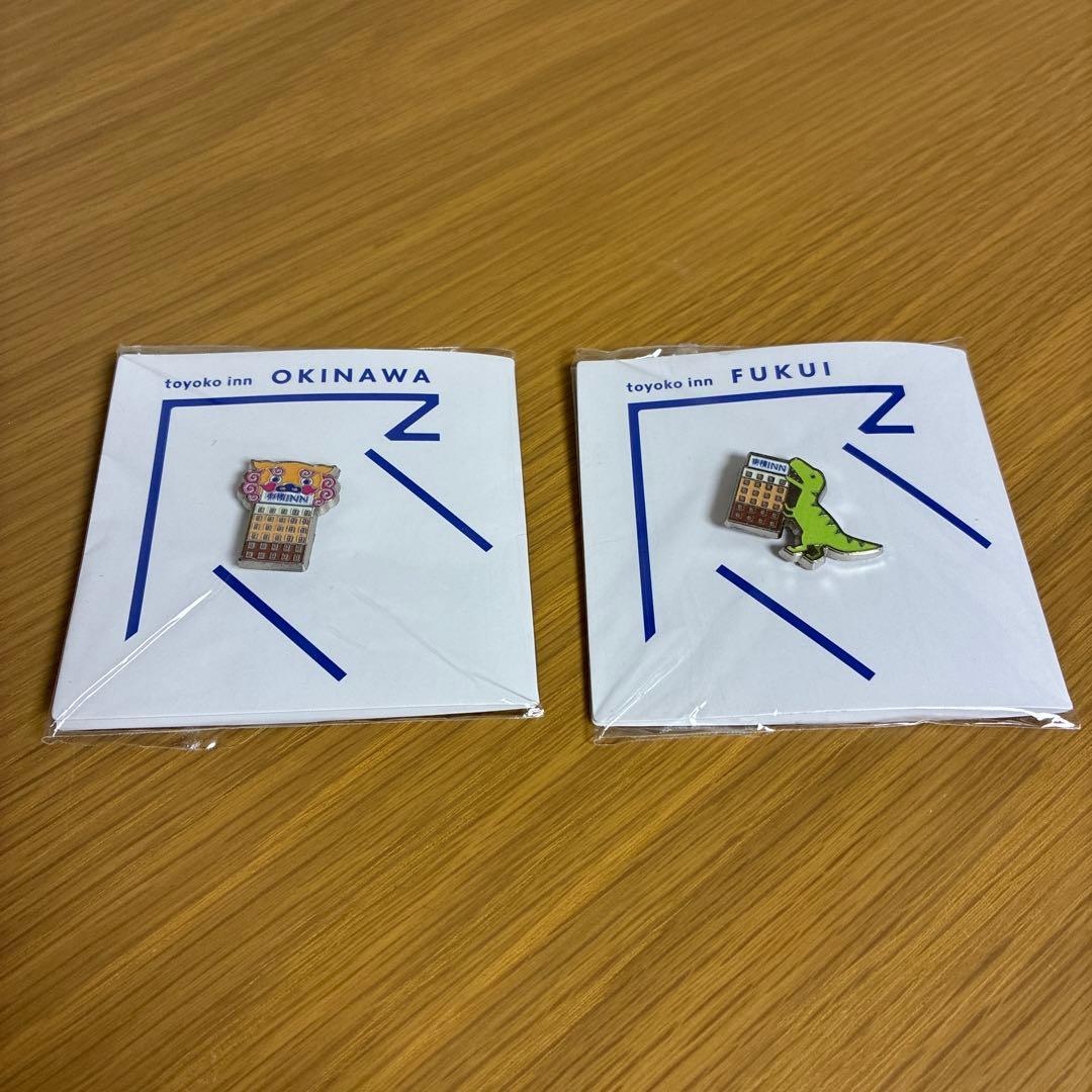 東横イン／福井県恐竜ピンバッジ 沖縄シーサーピンバッチ - メルカリ