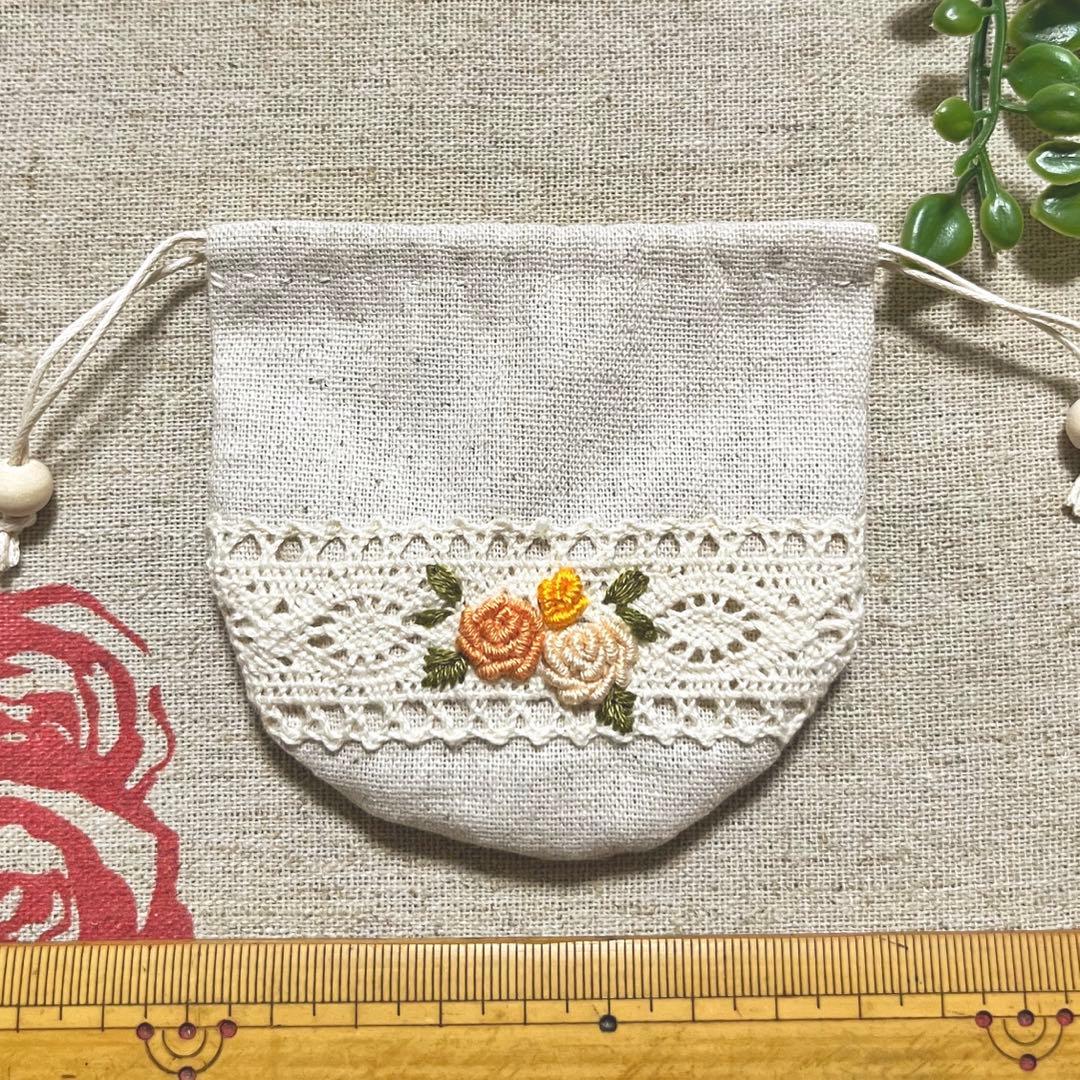 No.2306-63 手のひら巾着サシェ 香り袋 綿麻 ローズ刺繍 オレンジ