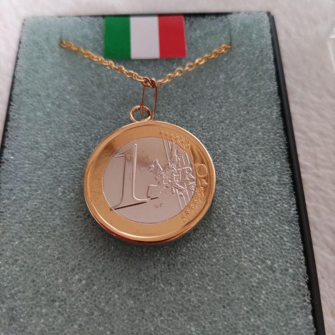 ペンダント。1ユーロ。ダ・ヴィンチデザイン