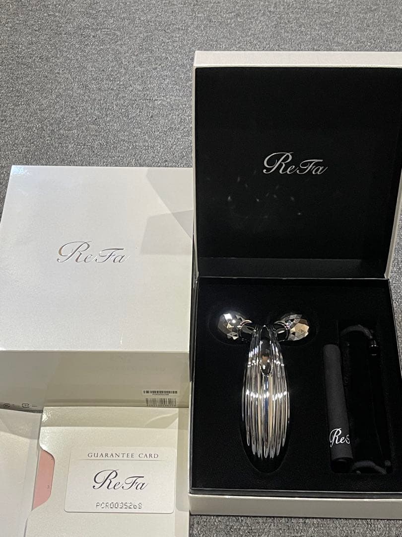 ReFa 美顔ローラー 専用ポーチ付き 箱あり説明書あり - メルカリ