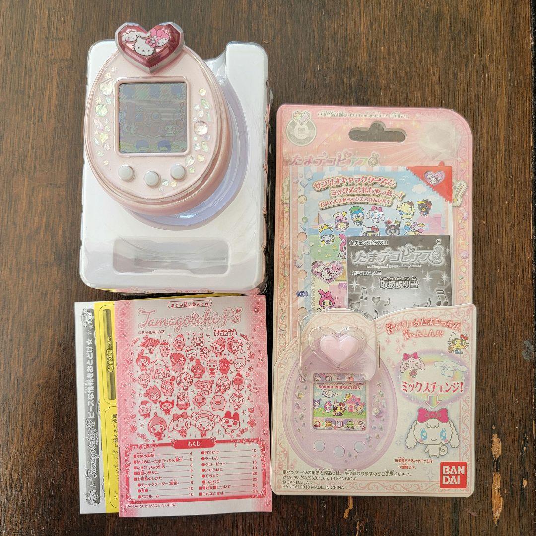 たまごっちピース本体+たまデコピアス（サンリオ）/ピンク/箱・説明書