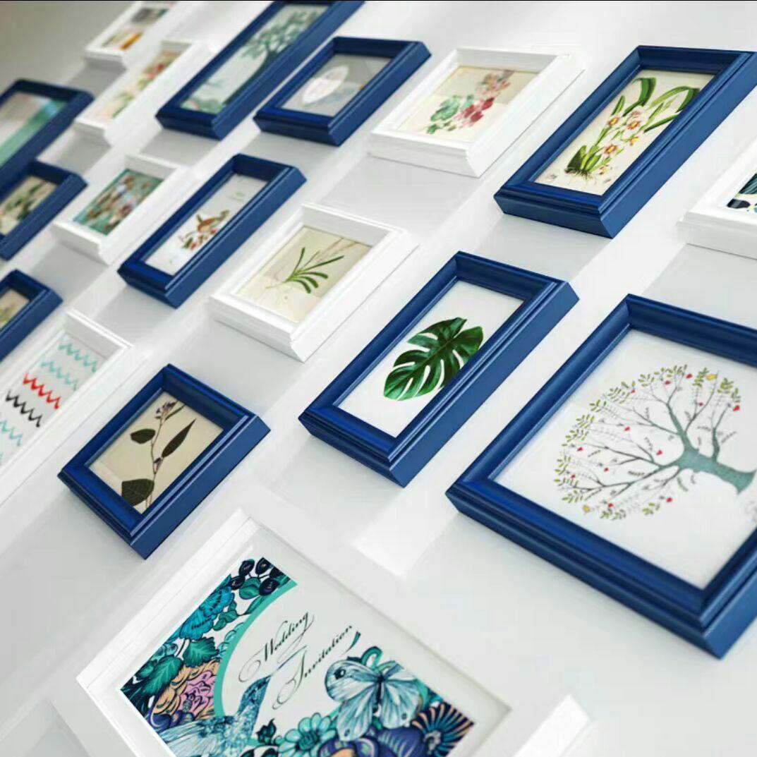 実木の写真立てのアイデアの壁の応接間の装飾画は壁の写真立てを掛けて穴を開けない