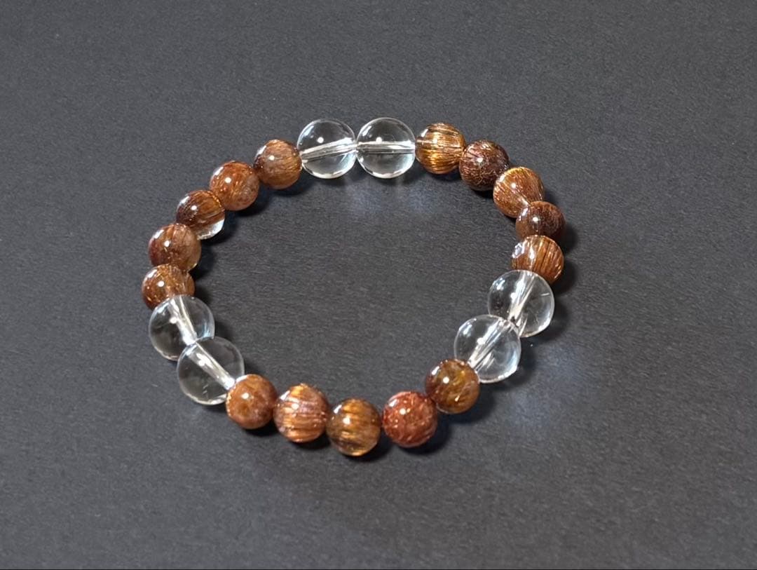 ゴールドキャッツアイルチル 水晶　ブレスレット（ルチル８mm、水晶１０mm）