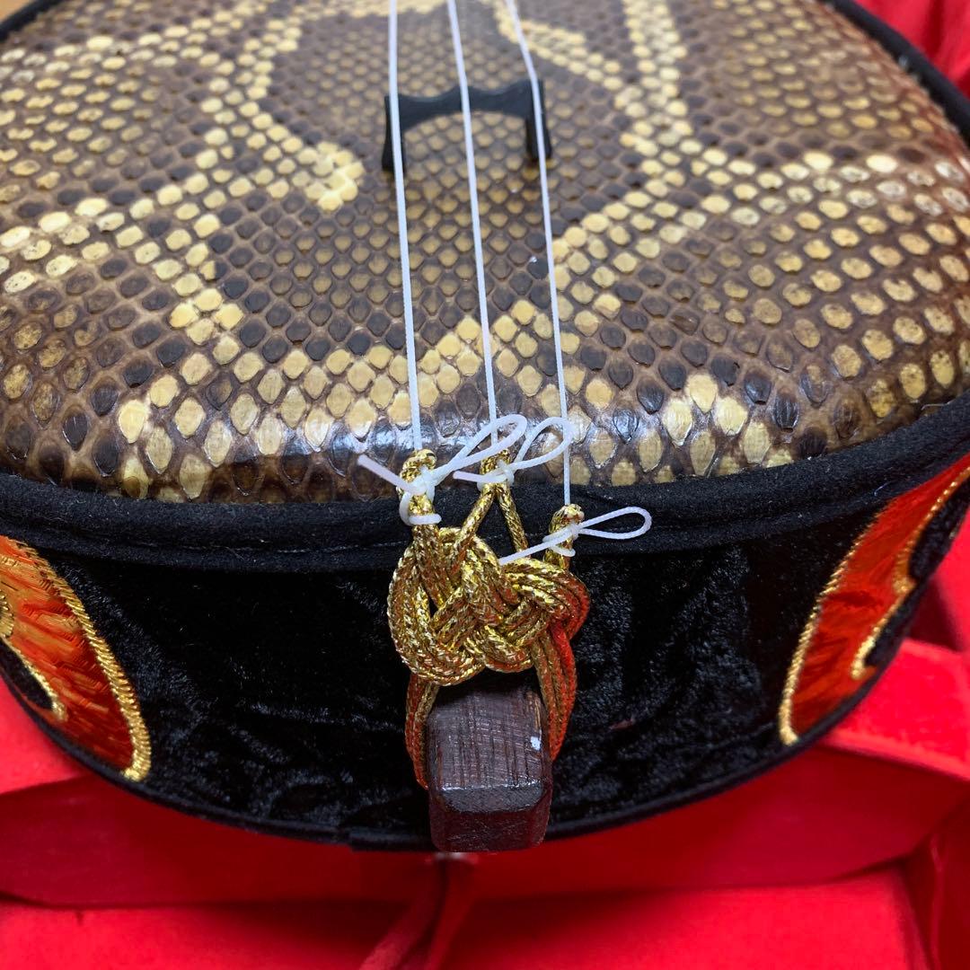 沖縄 三線 本蛇皮 強化張りハードケース付き