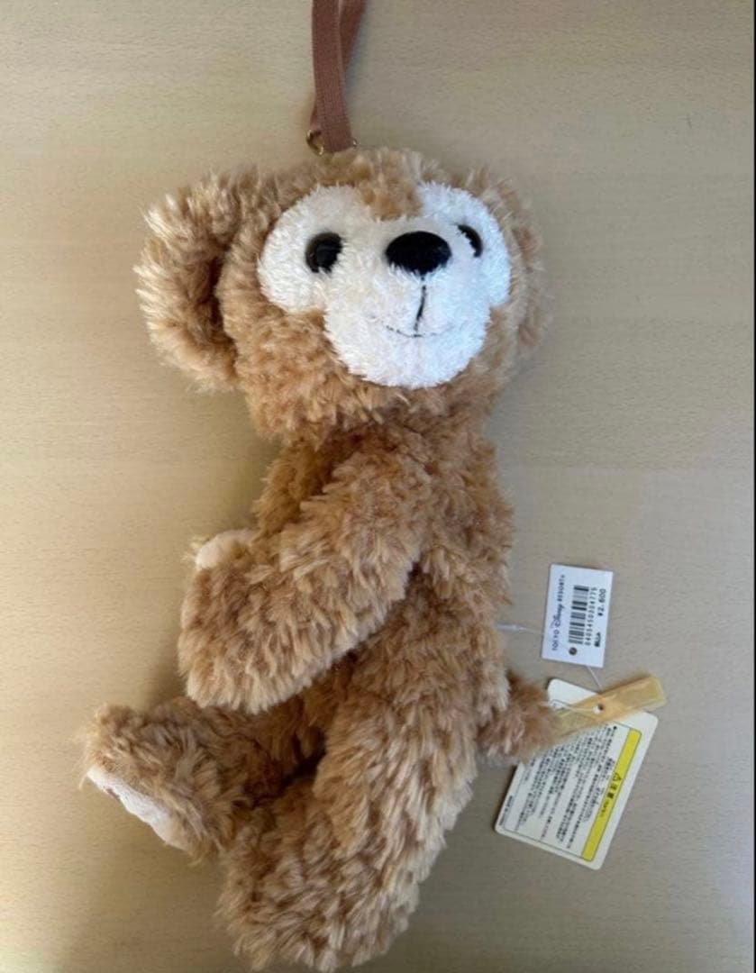 ダッフィーぬいぐるみ ストラップ付きポシェッ ト - メルカリ