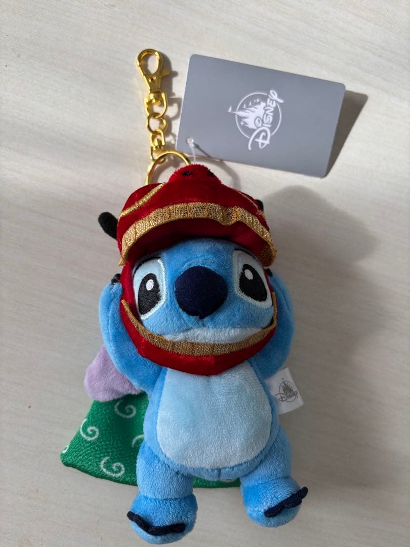 スティッチ ハッピーニューイヤー 獅子舞 キーチェーン - メルカリ