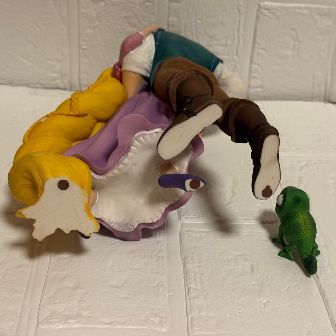 ディズニー EU限定 ラプンツェル フリン 置物 - メルカリ