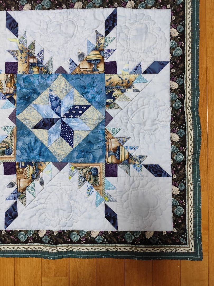 手縫いフェザースターのタペストリー