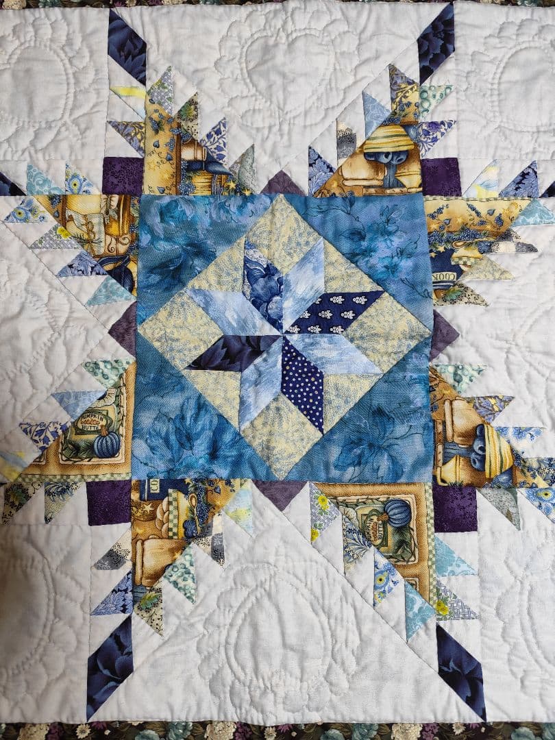 手縫いフェザースターのタペストリー