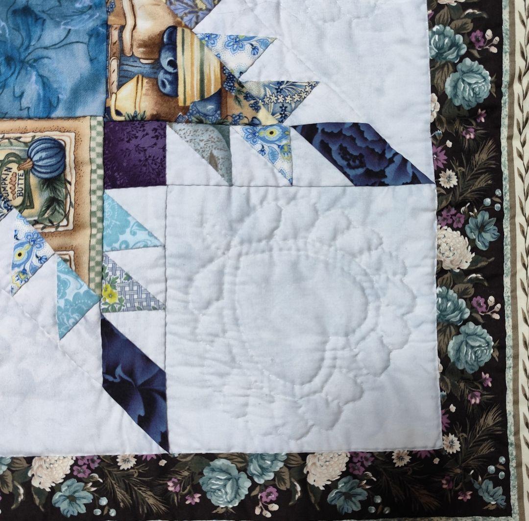 手縫いフェザースターのタペストリー