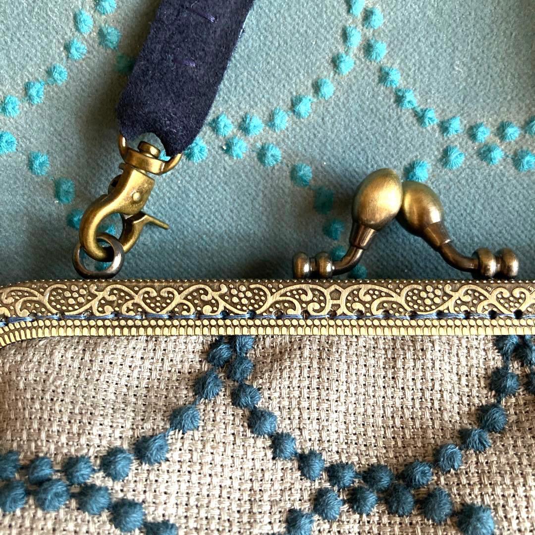 ミナペルホネン　がま口バッグ　コサージュ付き