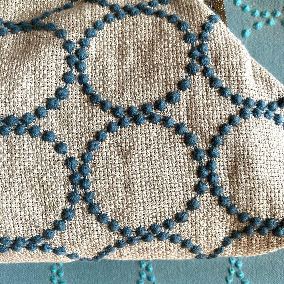 ミナペルホネン　がま口バッグ　コサージュ付き