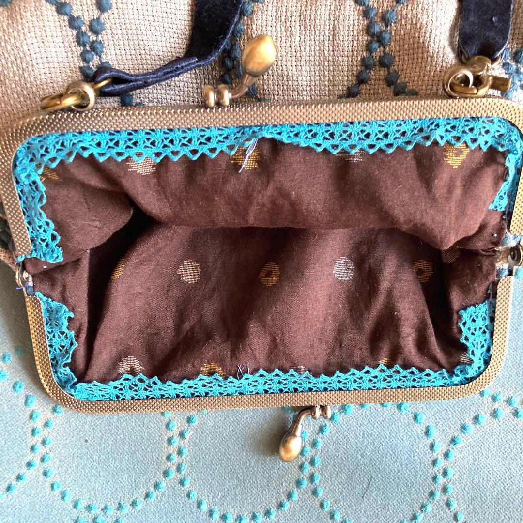 ミナペルホネン　がま口バッグ　コサージュ付き