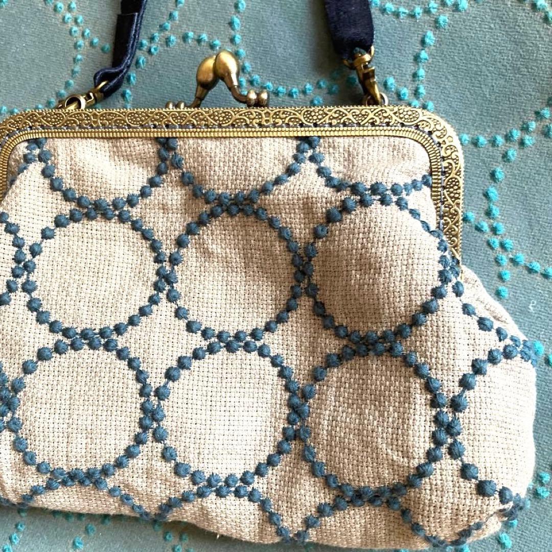 ミナペルホネン　がま口バッグ　コサージュ付き