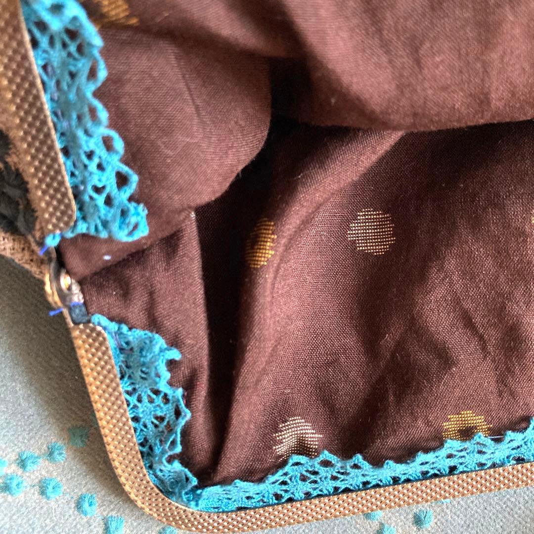 ミナペルホネン　がま口バッグ　コサージュ付き