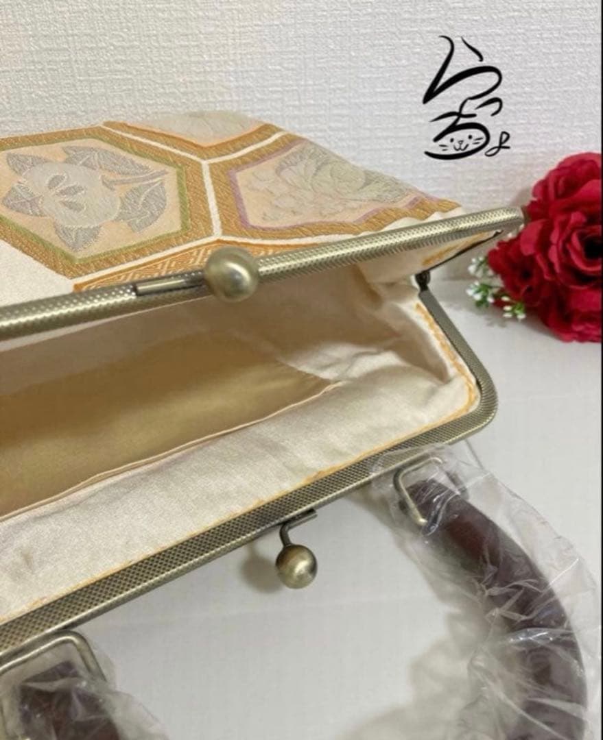 帯リメイク 亀甲に桐菊橘 持ち手付きがま口バッグ - メルカリ