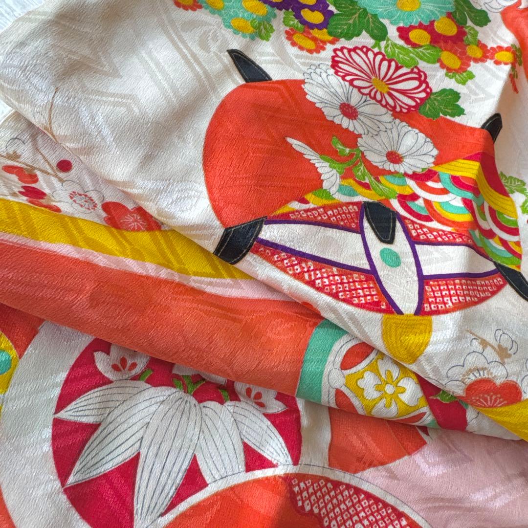 七五三に★アンティーク着物　コーラルピンクに切嵌文　糸巻きと四季花々　5歳　7歳