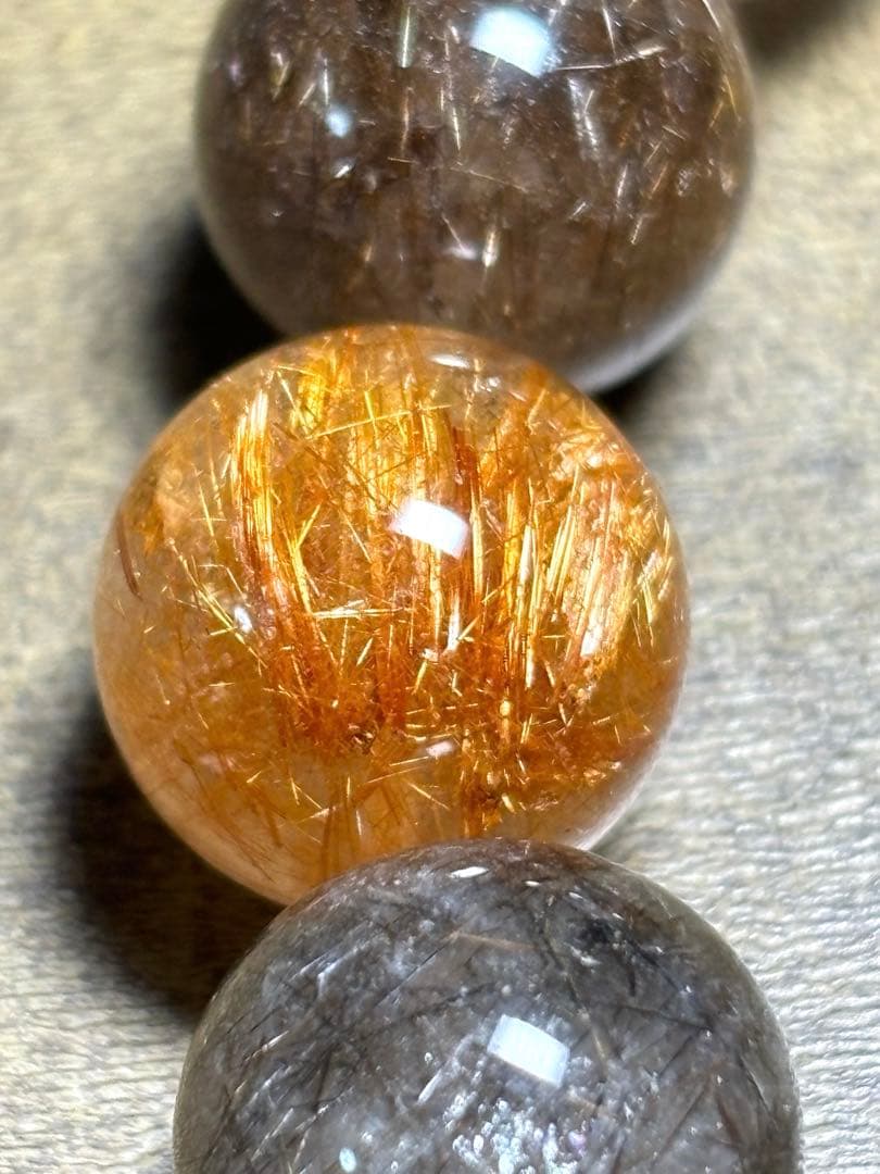 【新入荷】　ミックスタイチンルチルクォーツブレス12.9〜13.8㎜大玉（新品）