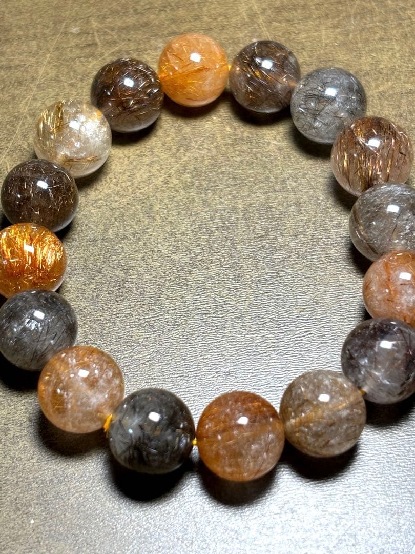 【新入荷】　ミックスタイチンルチルクォーツブレス12.9〜13.8㎜大玉（新品）