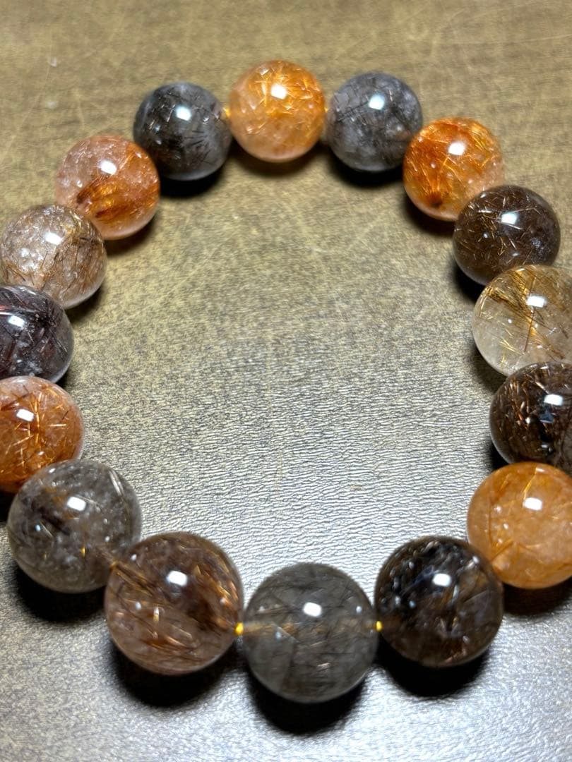 【新入荷】　ミックスタイチンルチルクォーツブレス12.9〜13.8㎜大玉（新品）