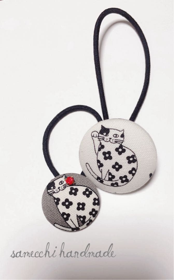 猫と花のハンドメイドヘアゴム2個セット - メルカリ