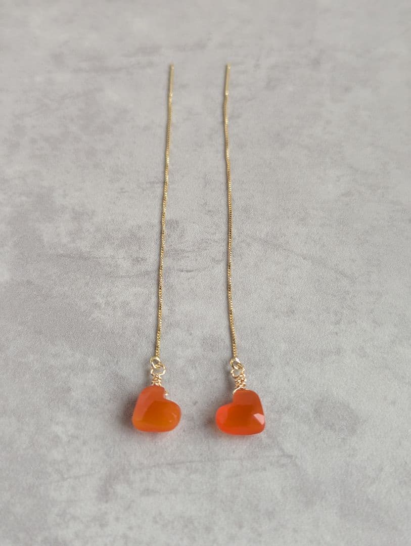 コロンとしたカーネリアンのアメリカンピアス① - メルカリ