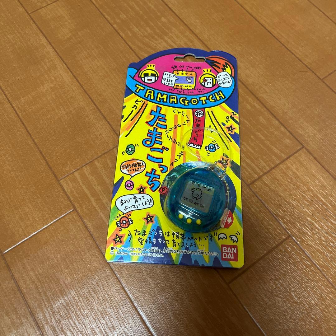 初代 たまごっち 新品未開封スケルトンブルー透明青1996年 - メルカリ