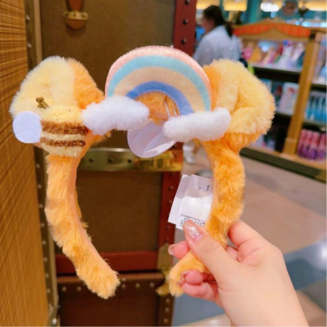 上海ディズニー プーさん仲間たち はちみつと虹 カチューシャ - メルカリ