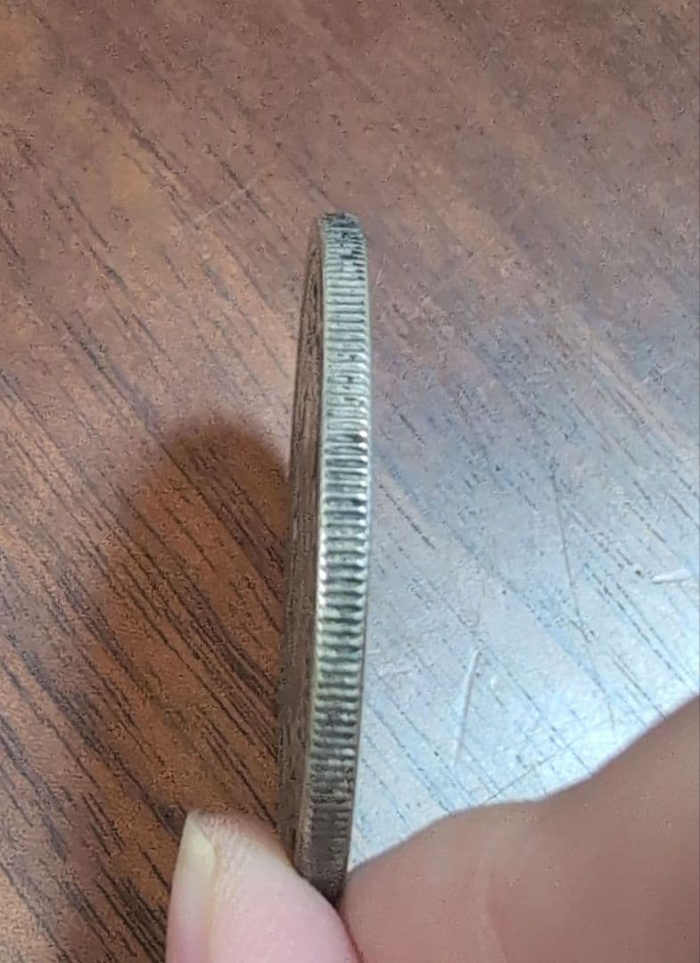 明治14年 一円銀貨