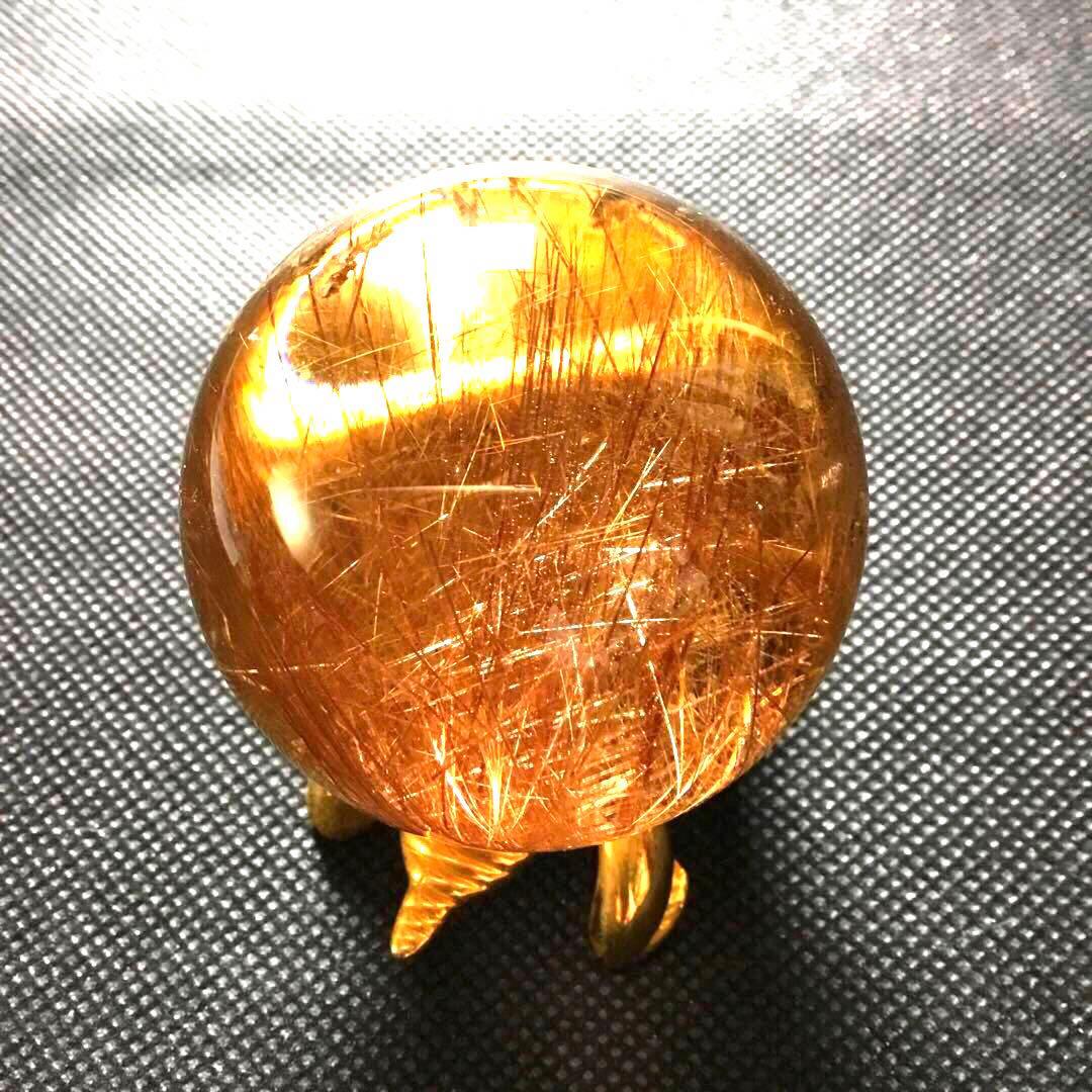 ゴールドルチルクォーツ置物　丸玉　ブラジル産　直経約4.83cm 重さ約160g