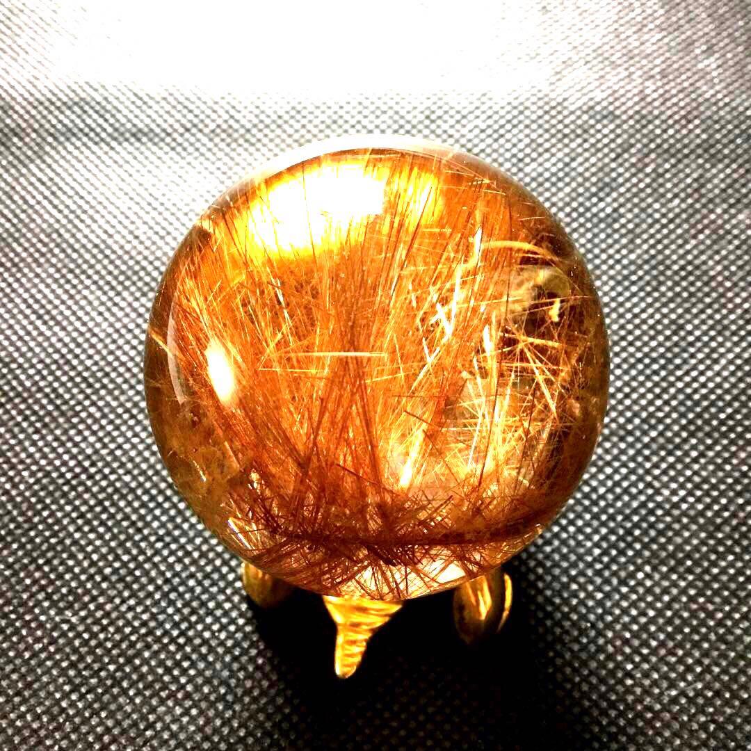 ゴールドルチルクォーツ置物　丸玉　ブラジル産　直経約4.83cm 重さ約160g