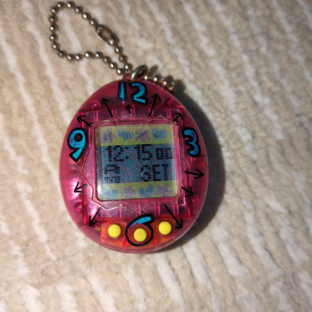 たまごっち 初代 スケルトンピンク 時計柄 レア - メルカリ