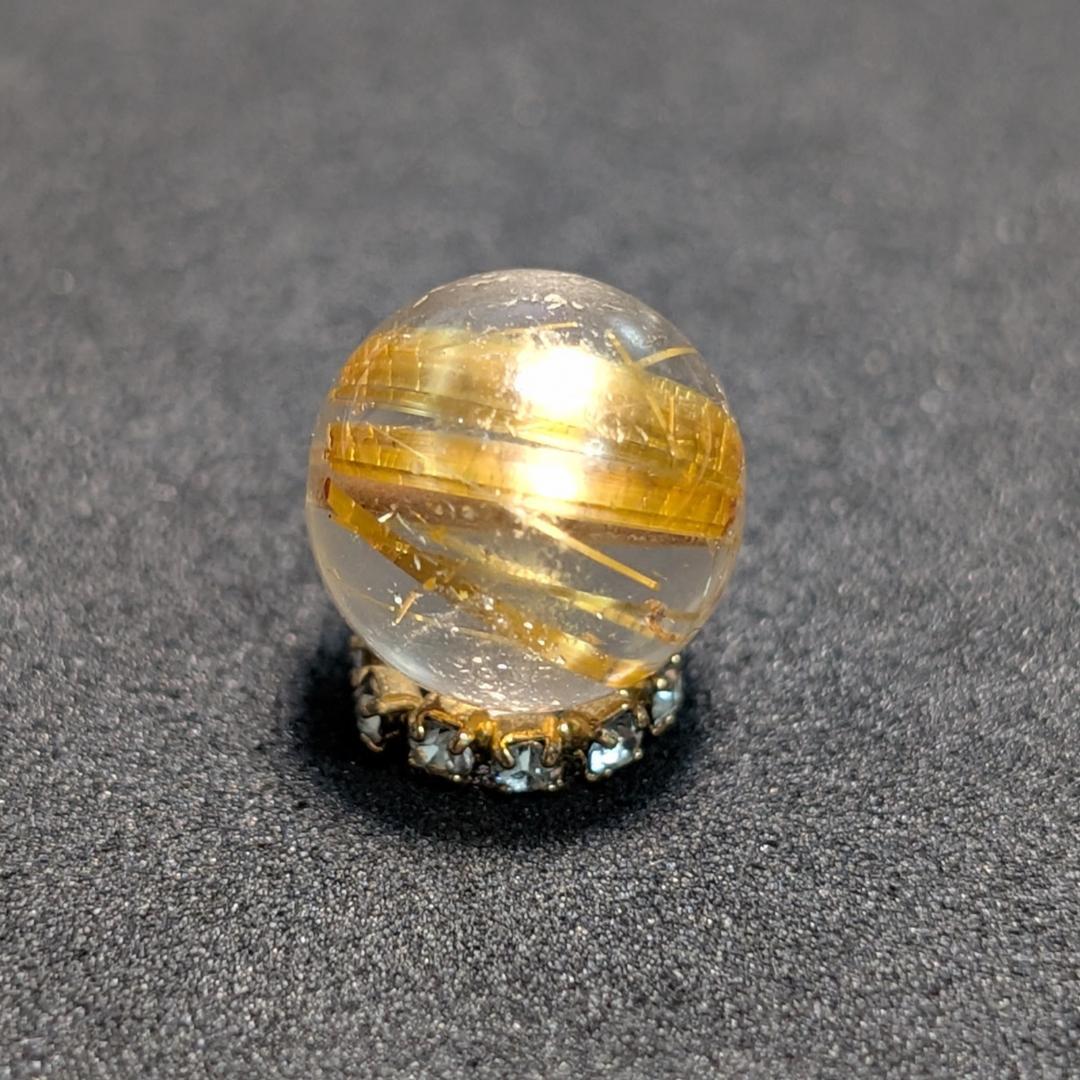 一点物【迫力満点】ゴールド タイチンルチル 10ミリ 貫通穴あり お守り石