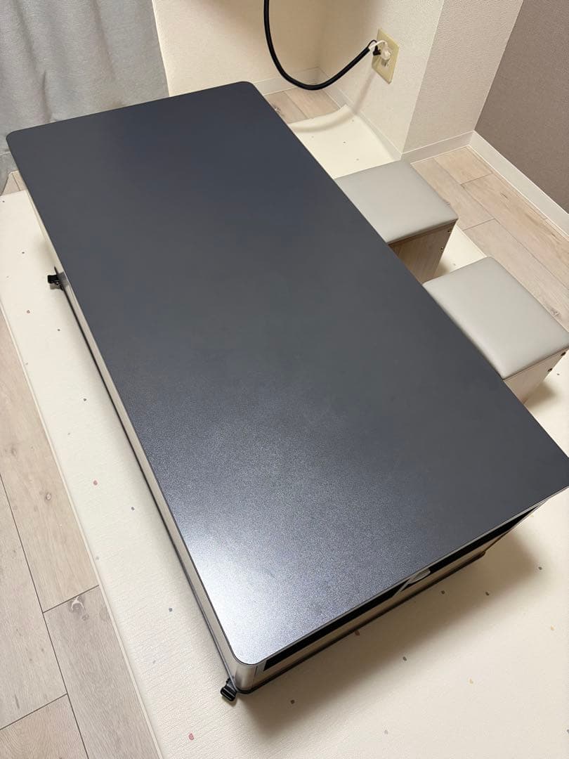 [江戸川区] CAGUUU 昇降式セラミックリビングテーブル