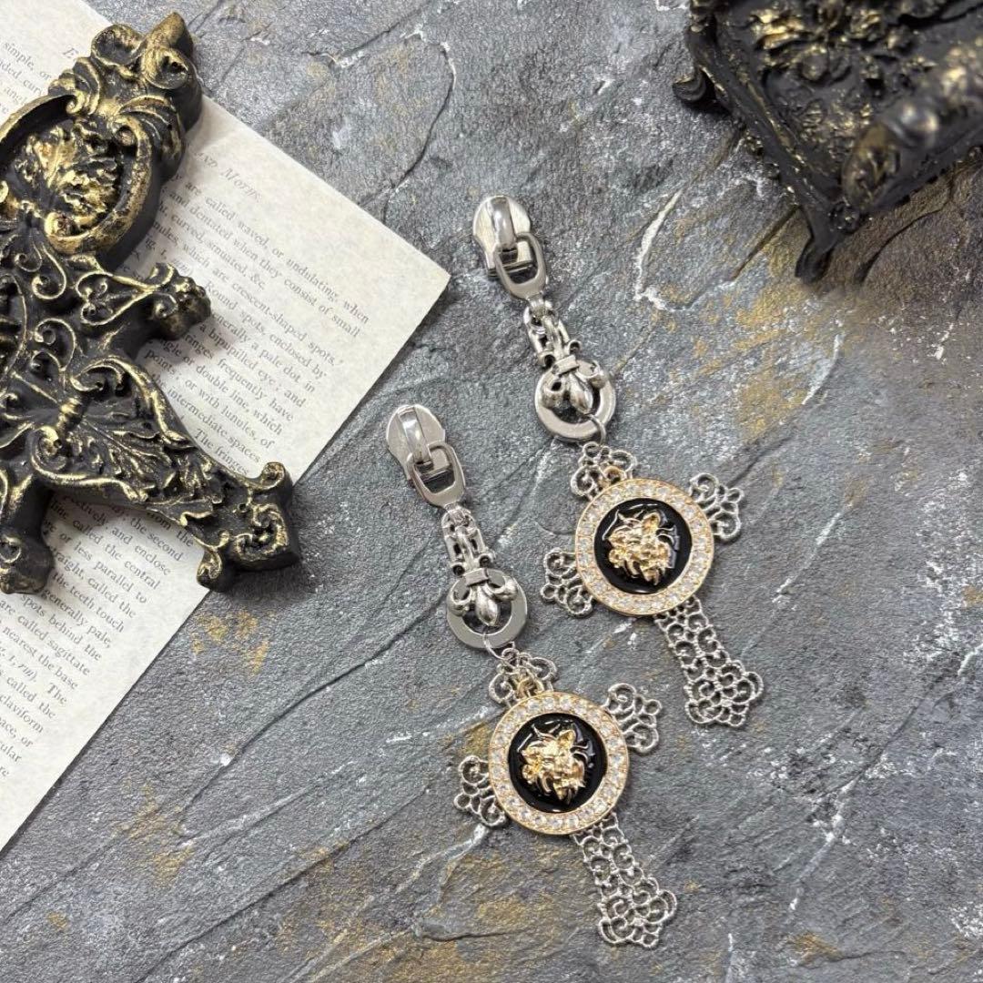 136 ジッパー✖︎クロス✖︎ライオンのMIXカラー　ピアスorイヤリング for Gift”クロッシングピアス（ツイスト）/シルバー925 | LION HEART