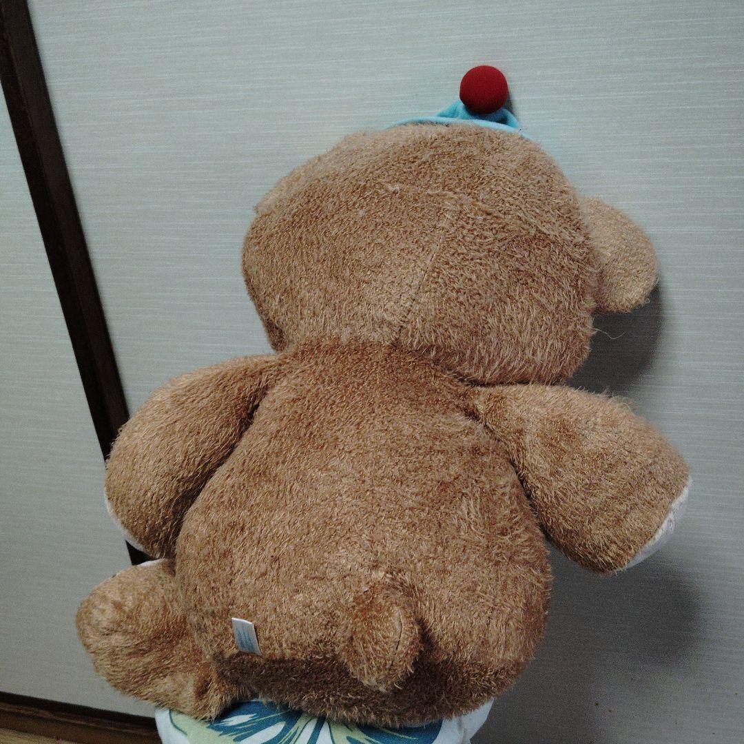 茶色いクマのぬいぐるみ 青い帽子付き