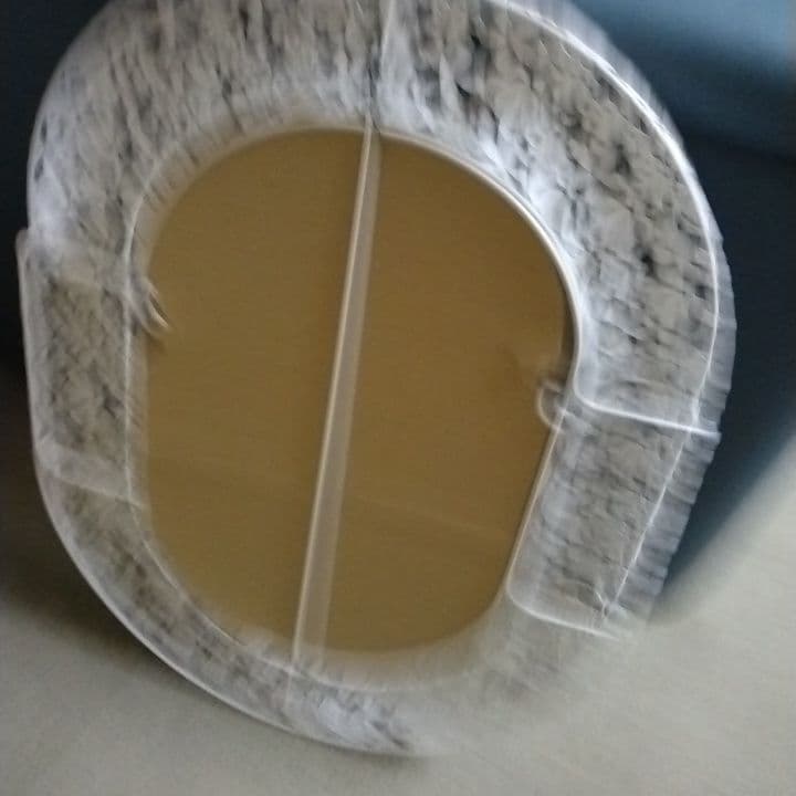 壁掛けミラー　オーバル 花模様　アイアン　透かし細工