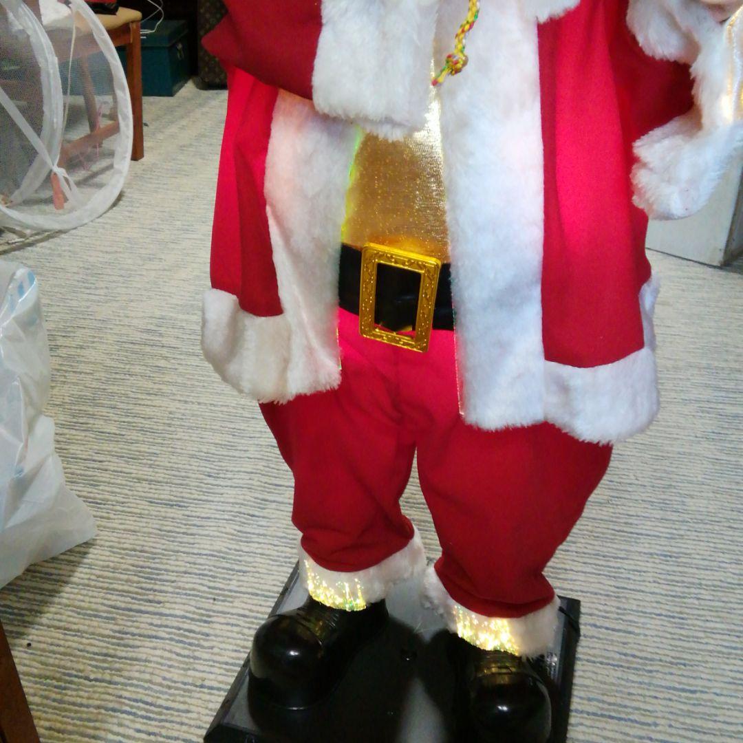 光る 歌う 踊る サンタクロース人形土台付き - メルカリ