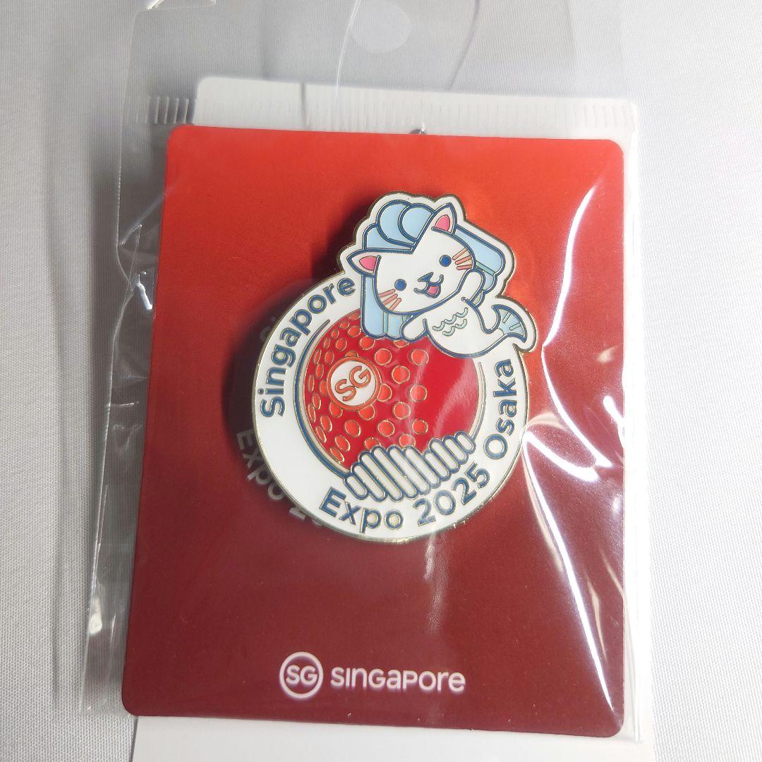 万博 シンガポール マーリー ピンバッジ - メルカリ