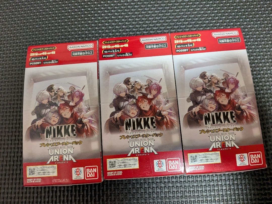 ユニオンアリーナ NIKKE プレシャスブースターパック テープカット