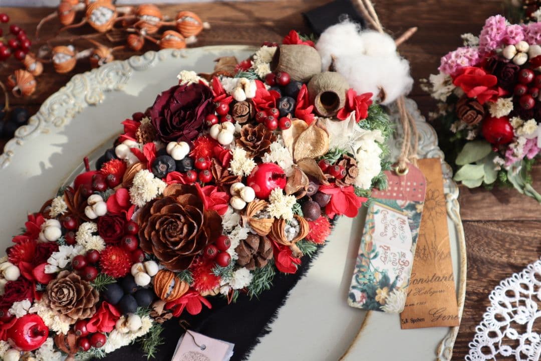 ドライフラワーꕤ︎︎バラと木の実いっぱいクリスマス縦長ガーランドꕤアンティーク