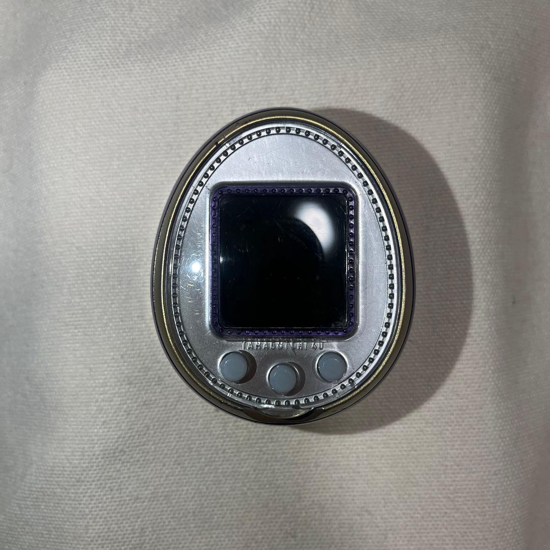 たまごっち 紫と白 51904 - メルカリ