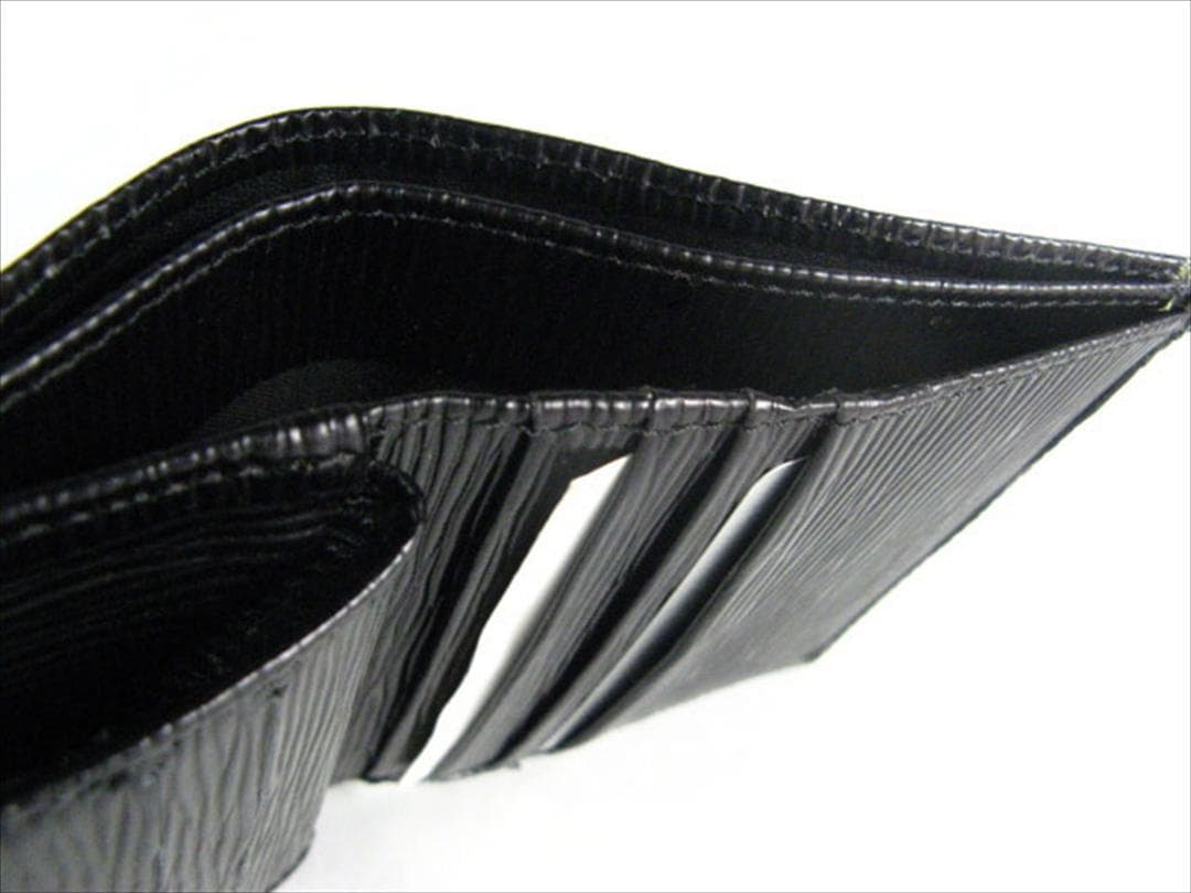 二つ折り財布　ウェーブ（牛革型押し）