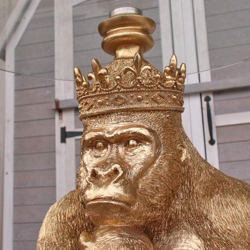 王冠ゴリラのガラステーブル ゴールド ガラス天板 143-213