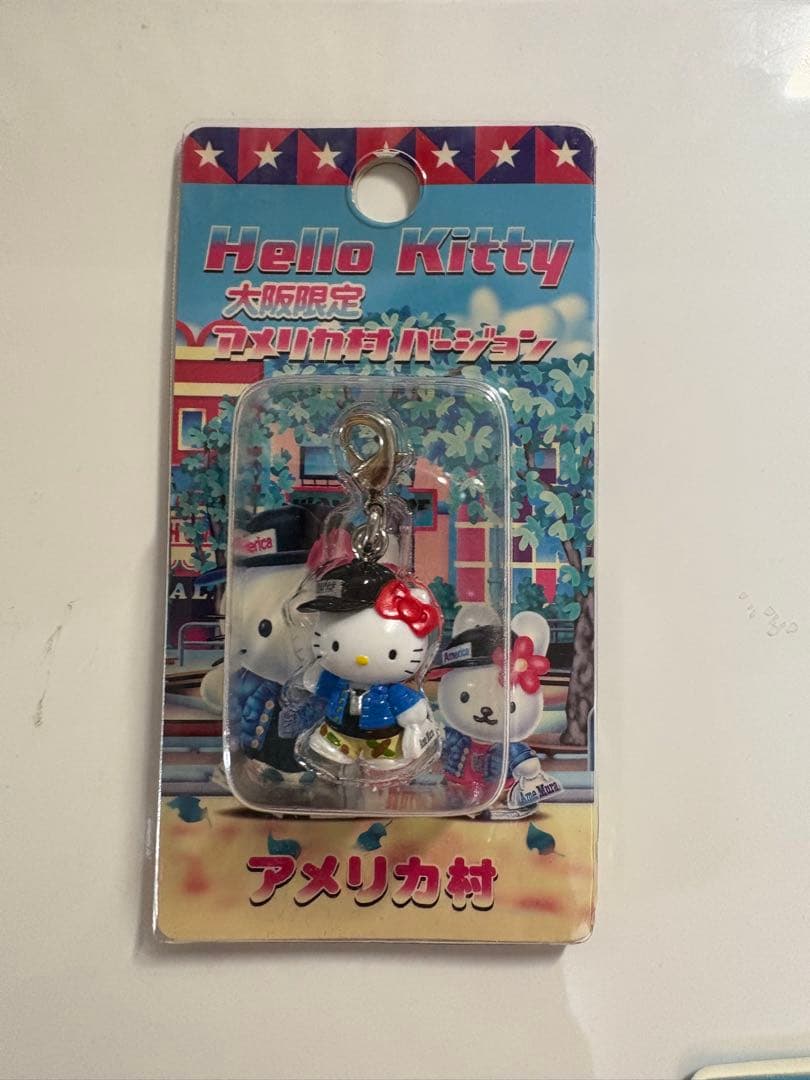 ご当地キティ　大阪　鹿児島　アメリカ村　北新地　通天閣　新世界　ちんどん屋　桜島