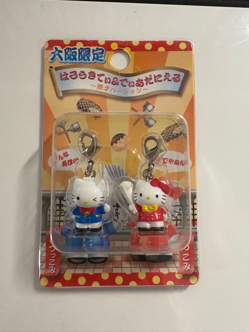 ご当地キティ　大阪　鹿児島　アメリカ村　北新地　通天閣　新世界　ちんどん屋　桜島