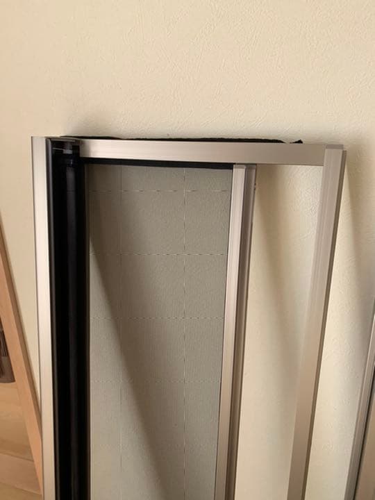 トステム 縦滑り出し窓用網戸