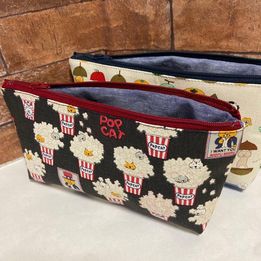 ポップコーンネコのポーチ ブラック